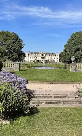Image of a manor house and grounds